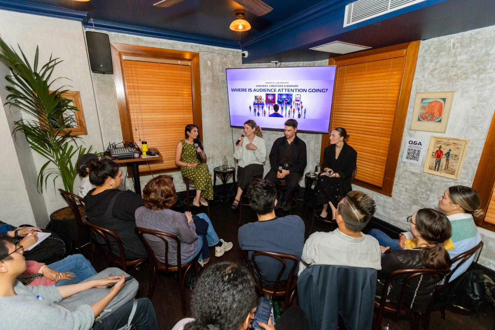 A Creator Co-labs panel on audience attention, with the audience seated in front