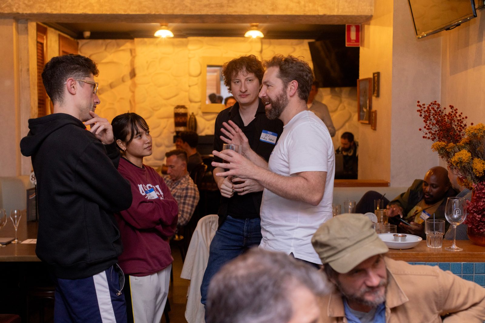 Guests talking in a group at a Creator Co-labs night