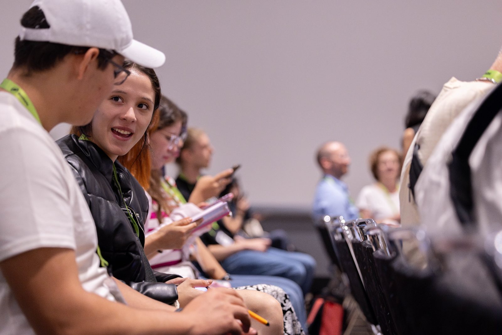 Two workshop participants turning to talk to each other